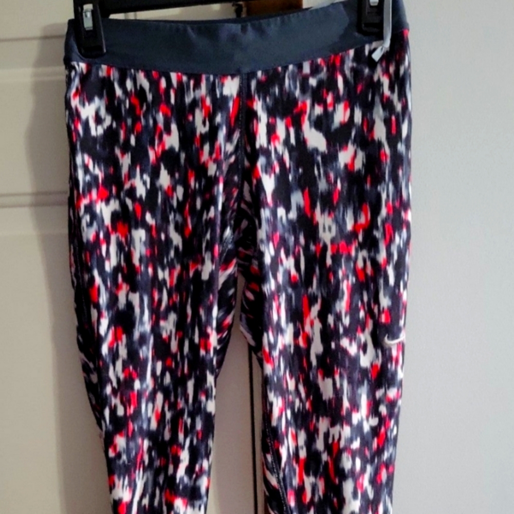 Beautiful capris. Nike Dri-Fit Sz.Sm Pink grey and black,white